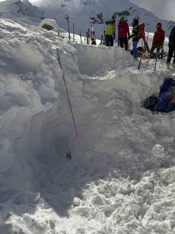 This photo released by the Italian National Alpine and Speleological Rescue Corps on April 1, 2025, shows the place where three skiers were buried by an avalanche on Giau Pass on March 16, 2025. (Italian National Alpine and Speleological Rescue Corps via AP)