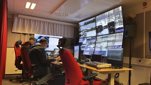 This undated photo, issued by SVT, shows preparations in Junsele, Sweden for the livestream 'The Great Moose Migration' to document the annual Moose migration near Kullberg in northern Sweden. (SVT via AP)