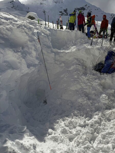 This photo released by the Italian National Alpine and Speleological Rescue Corps on April 1, 2025, shows the place where three skiers were buried by an avalanche on Giau Pass on March 16, 2025. (Italian National Alpine and Speleological Rescue Corps via AP)