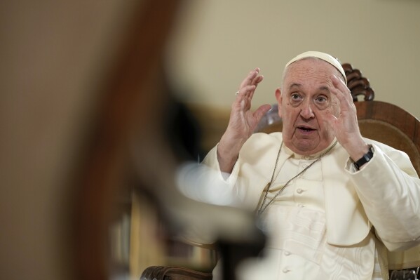 FILE - Pope Francis speaks during an interview with The Associated Press at The Vatican, Tuesday, Jan. 24, 2023. Francis' apology Tuesday, May 28, 2024, for using a vulgar term to refer to gay men was the latest comment to make headlines about the Catholic Church's teachings on homosexuality. Francis has made a hallmark of reaching out to LGBTQ+ Catholics, but his 11-year pontificate has also seen plenty of problems arise over his informal way of speaking and his outreach, evidence of how fraught the issue is for the church. (AP Photo/Andrew Medichini, File )