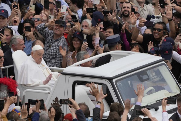 Pope Francis tours the crowd at the end of the Easter mass in St. Peter's Square at the Vatican Sunday, April 20, 2025. Francis died Monday, April 21, 2025. (AP Photo/Gregorio Borgia)