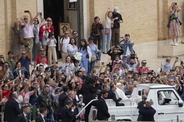 Pope Francis tours the crowd at the end of the Easter mass in St. Peter's Square at the Vatican Sunday, April 20, 2025. Francis died Monday, April 21, 2025. (AP Photo/Gregorio Borgia)