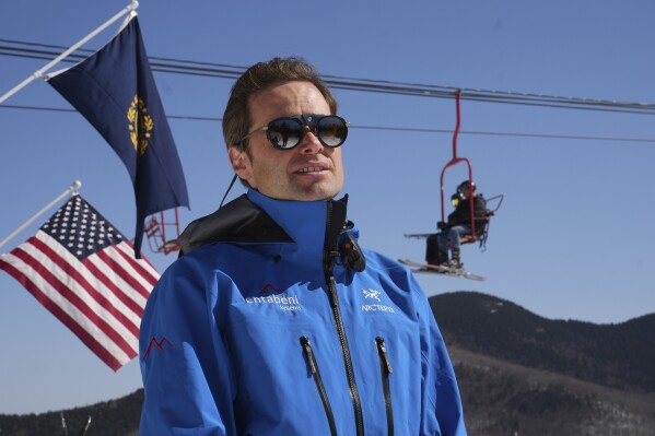 Erik Mogensen, founder of Entabeni Systems and the general manager of Black Mountain, is interviewed slope side at the mountain, Friday, March 14, 2025, in Jackson, N.H. (AP Photo/Charles Krupa)