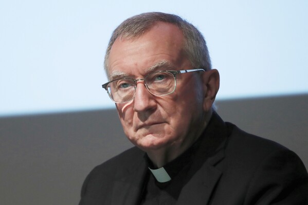 Cardinal Pietro Parolin attends at the 150th anniversary of the arrival of Catholic missionaries in China from an Italian religious order meeting, in Milan, Italy, on Oct. 3, 2020. (AP Photo/Antonio Calanni)