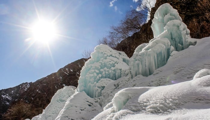 This photograph, taken on March 18, 2025, shows an artificial glacier built by local residents during winters to conserve water for the summers at Pari village in Kharmang district, in the mountainous Gilgit-Baltistan region. — AFP