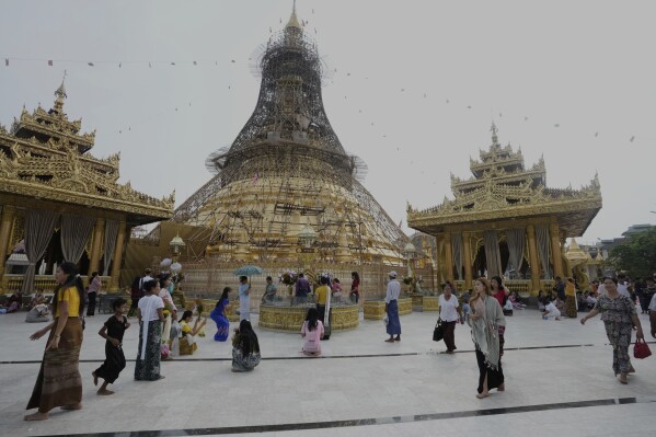 Buddhist devotees visit Botataung pagoda during a religious ceremony to mark the Full Moon day of